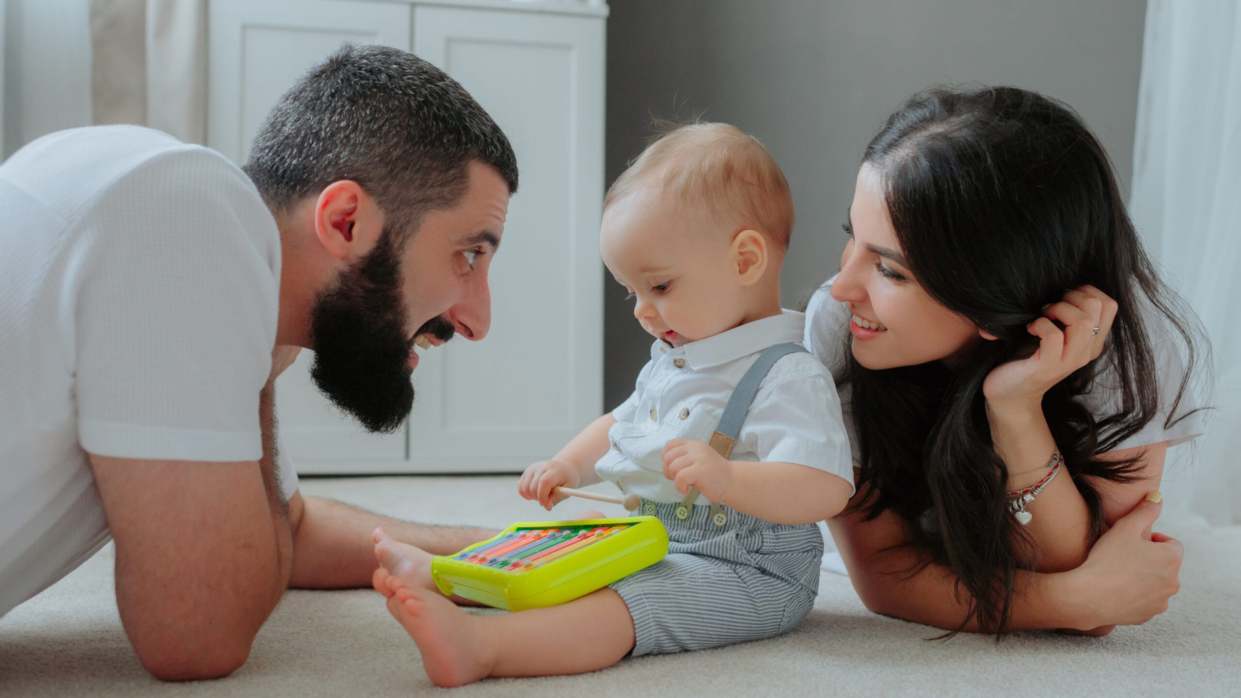Happy parents with their baby after successful IVF treatment at Valley Fertility Centre